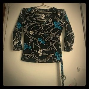 A black, white, and blue blouse